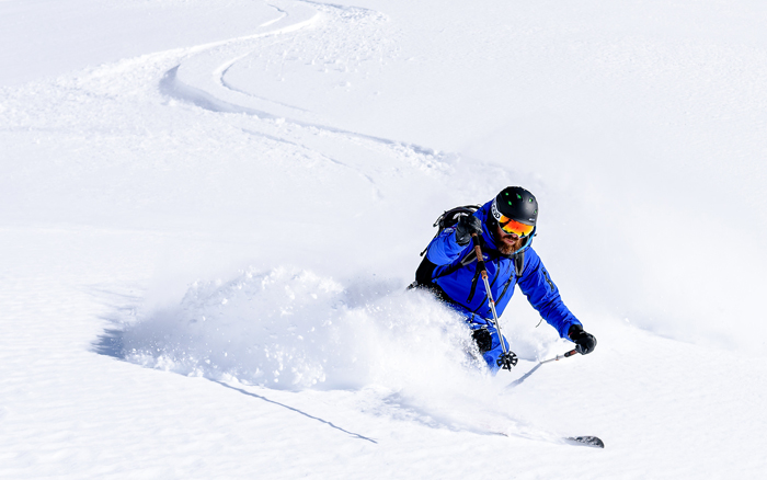 Altitude Ski Instructor skiing in powder - off-piste ski lesson in Verbier